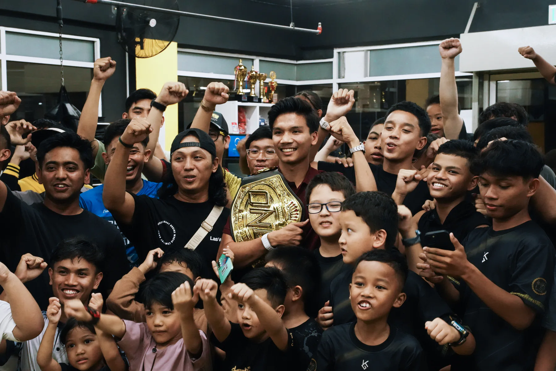 KIB GYM community celebrating together in the gym