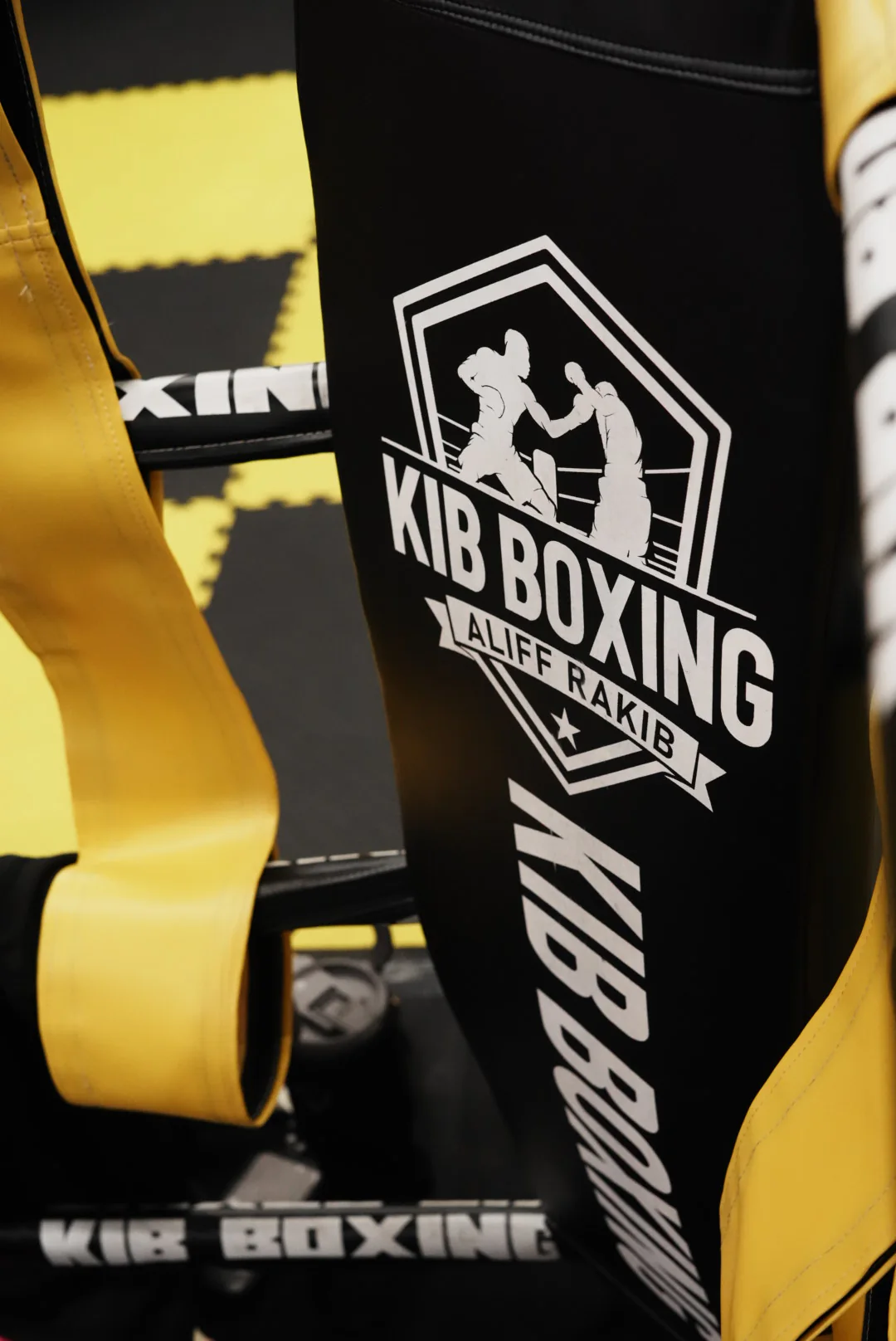 Close view of the branded KIB GYM ring corner